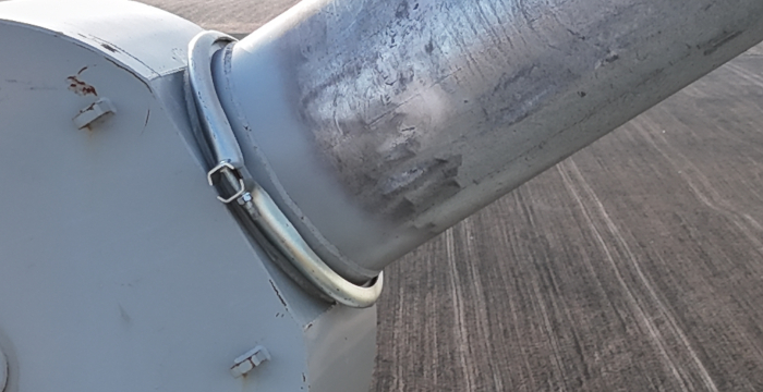 Close up of a grain storage connection for inspection.